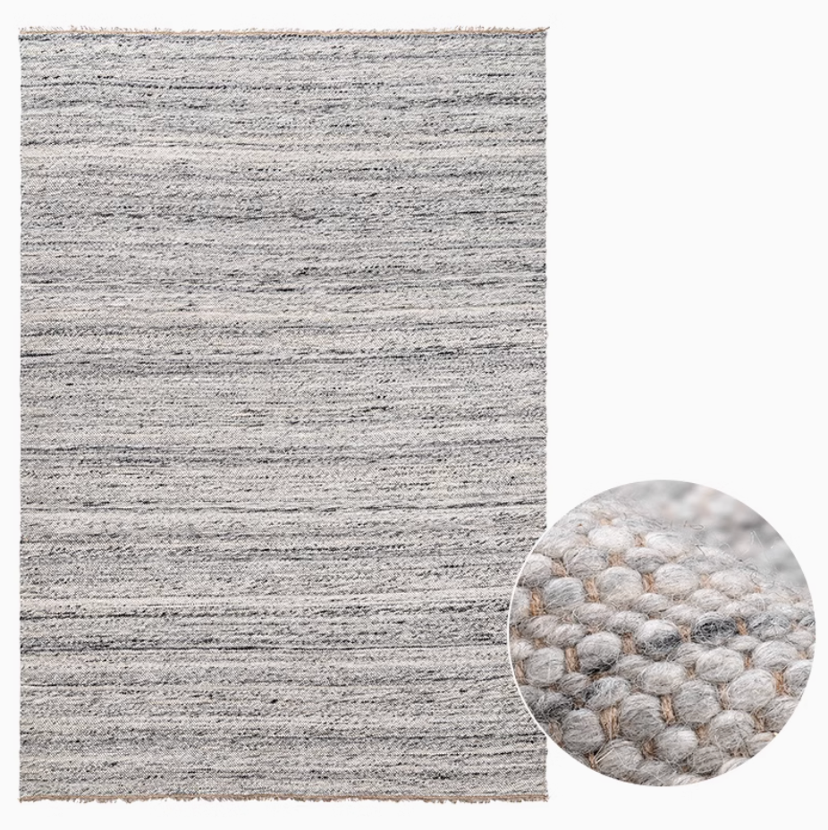 Natural wool carpet in light grey with textured woven stripes and detailed bobble texture close-up.